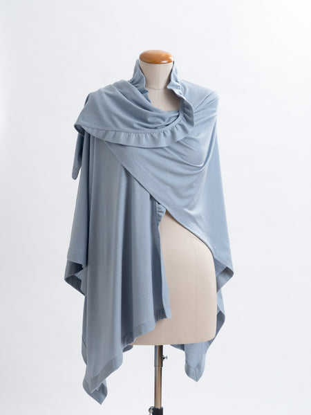 Powder blue Coco Merino wrap, drape it into place over your shoulder.