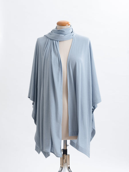 Powder blue Elle Merino wool scarf layered over a powder blue muse wrap for a collar effect.