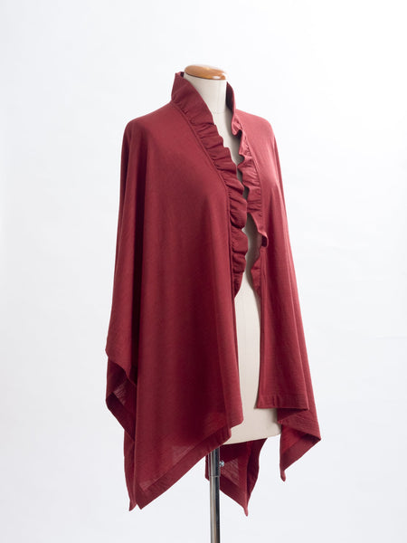 Garnet rust Merino wool, the Coco frill sits up onto your neck for extra coverage and a pretty detail.