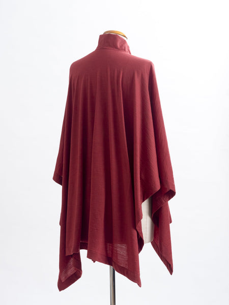 Garnet rust Merino wool, the Coco frill adds pretty detailing at the back neck.