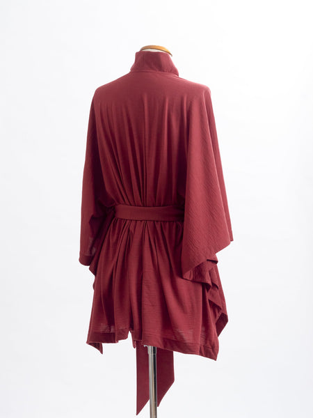 Garnet rust Merino wool, the Coco frill sits up onto your neck for extra coverage and  pretty detailing.