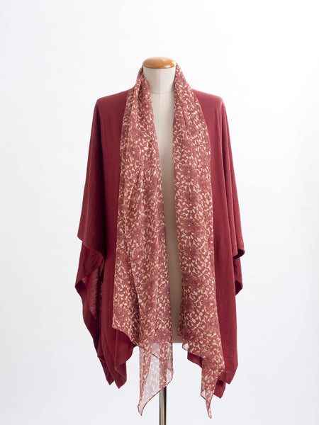 Odette Floral Silk Scarf  Sheer, soft and feminine, this floral silk has a beautiful fine pleat like creped texture, garnet rust flowers and leaves layered on a wash of cream and blush, with soft white highlights. An amazing accessory to pair with so many colours and a perfect way to add some warmth up near your face if you’re wearing a white T and jeans.  !00% Silk Yoryu pictured here with the garnet rust Muse Merino wrap.