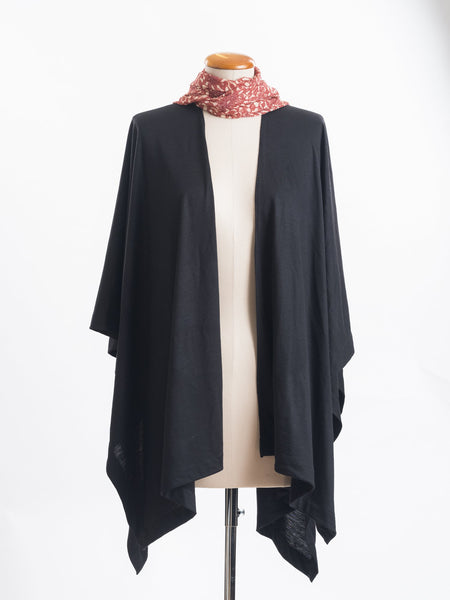 Odette Floral Silk Scarf  Sheer, soft and feminine, this floral silk has a beautiful fine pleat like creped texture, garnet rust flowers and leaves layered on a wash of cream and blush, with soft white highlights. An amazing accessory to pair with so many colours and a perfect way to add some warmth up near your face if you’re wearing a white T and jeans.  !00% Silk Yoryu, pictured here with the black Muse Merino wrap.