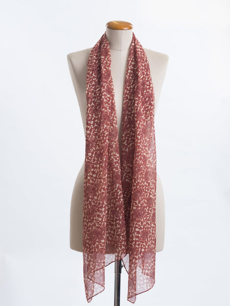 Odette Floral Silk Scarf  Sheer, soft and feminine, this floral silk has a beautiful fine pleat like creped texture, garnet rust flowers and leaves layered on a wash of cream and blush, with soft white highlights. An amazing accessory to pair with so many colours and a perfect way to add some warmth up near your face if you’re wearing a white T and jeans.  !00% Silk Yoryu