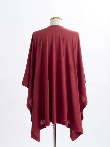 Garnet rust Muse wrap, the generous cut falls beautifully at the back 