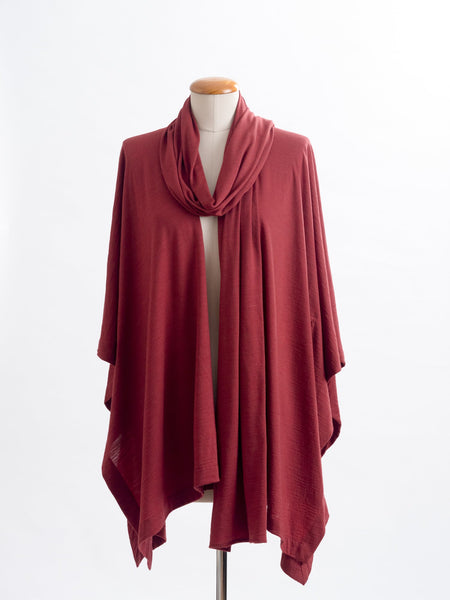 Garnet rust Elle Merino wool scarf layered over a garnet rust muse wrap for a collar effect.