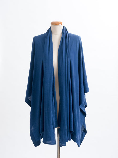 Teal Elle Merino wool scarf layered over a teal muse wrap for a collar effect.