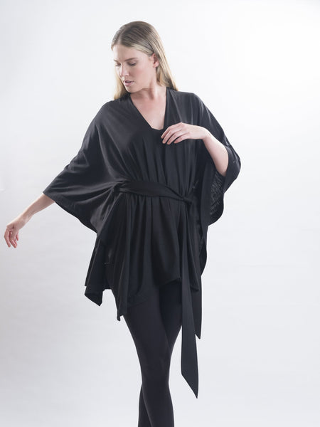 So comfortable and easy to wear, the black Merino wool Muse wrap is super light weight.