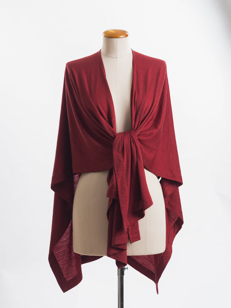 Garnet rust Muse Merino wool wrap, tie it several ways to achieve different looks.